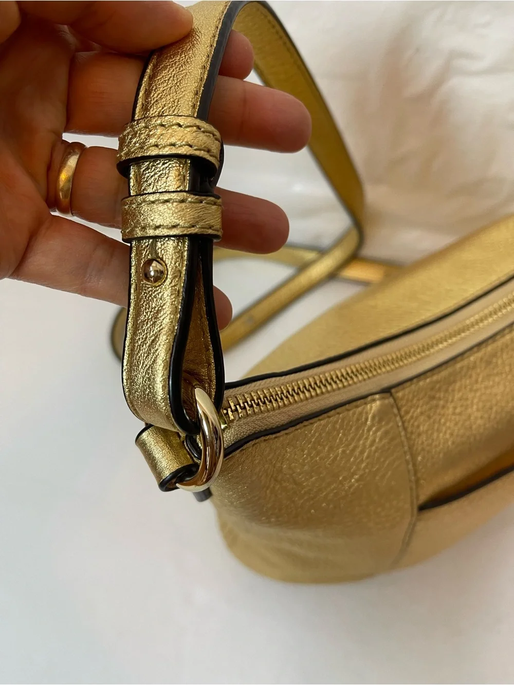 Michael Kors Gold leather hobo crossbody bag.
